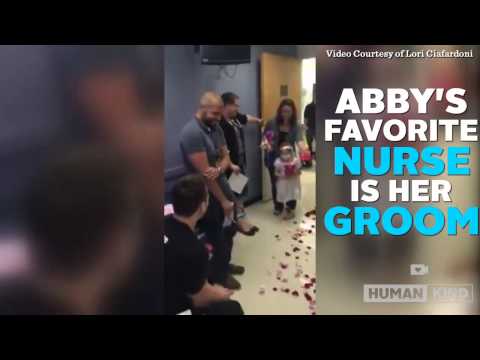 Little girl fighting cancer 'marries' her favorite nurse