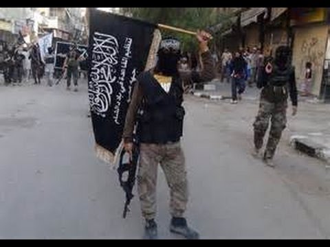 2014 August Breaking news Associated press ISIS raid Lebanese town capture troops