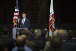 Secretary of Defense Ash Carter announces the creation of a National Manufacturing Innovation Institute to produce hybrid electronics during a speech at the National Full Scale Aerodynamics Complex on Moffett Federal Airfield, Calif., Aug. 28, 2015.