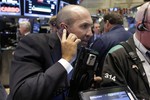 Trader James Denaro works on the floor of the New York Stock Exchange, Tuesday, Sept. 1, 2015.