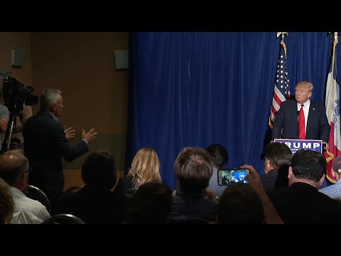 Donald Trump Confronted by Univision Jorge Ramos at Iowa Press Before Rally Speech