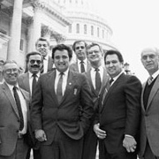 Members on the Capitol steps