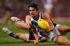 PERTH, AUSTRALIA - SEPTEMBER 13: Chad Wingard of the Power looks to handball during the AFL 1st Semi Final match between the Fremantle Dockers and the Port Adelaide Power at Patersons Stadium on September 13, 2014 in Perth, Australia.  (Photo by Paul Kane/Getty Images)