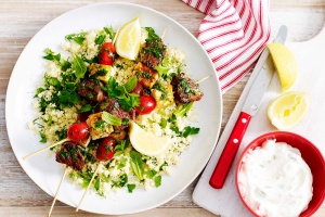 Lamb, tomato and haloumi skewers with herbed couscous