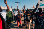 Protesters march through the streets of Ferguson. (Jamelle Bouie / Wikimedia Commons)