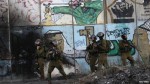 Israeli soldiers with grAFFITTI