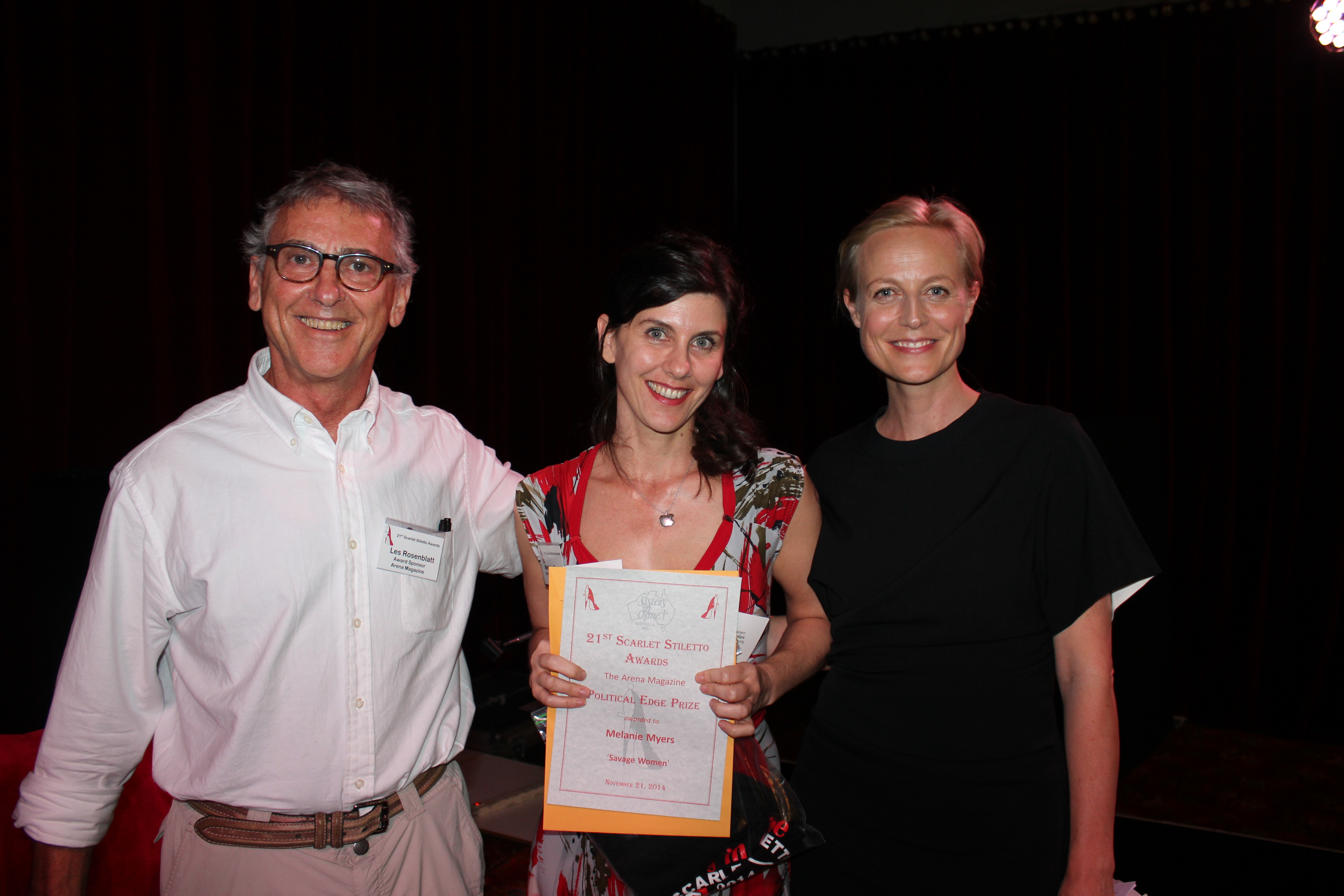 2014 Arena magazine prize winner Melanie Myers, flanked by Les Rosenbatt (Arena Magazine Board) & Awards presenter, actor Marta Dusseldorp