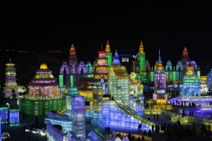 Visitors look at ice sculptures during a light-up rehearsal ahead of the Harbin Ice and Snow Sculpture Festival in the northern city of Harbin, Heilongjiang province.