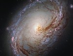 This new NASA/ESA Hubble Space Telescope shows Messier 96, a spiral galaxy just over 35 million light-years away in the constellation of Leo (The Lion), 4 September, 2015.