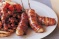 Pancetta-wrapped sausages