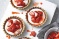 Sticky strawberry almond tarts