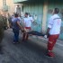 Palestinina man getting carried to ambulance