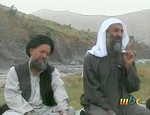 Osama bin Laden, right, and top deputy Ayman Al-Zawahri, left, are seen in this image broadcast Wednesday April 17, 2002, by the London based Middle East Broacasting Corp. who reported the tape was delivered to them on Wednesday.