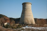 ** FILE ** The file photo, taken on December 18, 2007, and released on Friday June 27, 2008, by the official Chinese news agency Xinhua, shows the cooling tower at the Yongbyon nuclear complex near Pyongyang, North Korea.