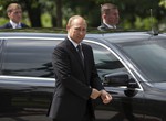 Russian President Vladimir Putin arrives to take part in a wreath laying ceremony at the Tomb of the Unknown Soldier outside Moscow's Kremlin Wall, in Moscow, Russia, Monday, June 22, 2015, to mark the 74th anniversary of the Nazi invasion of the Soviet Union.