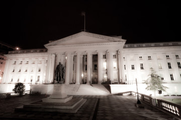 The exterior of the United States Treasury Department, photographed at night on August 1, 2010. (Wikimedia Commons / Florian Hirzinger)