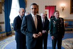 File - President Barack Obama waits in the Blue Room of the White House before announcing personnel changes in the East Room, April 28, 2011. Standing with the President, from left, are: Vice President Joe Biden, Ambassador Ryan Crocker, Secretary of Defense Robert Gates, and General David Petraeus.