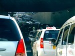 Noon time traffic in Manila Lagusnilad Underpass, Philippines