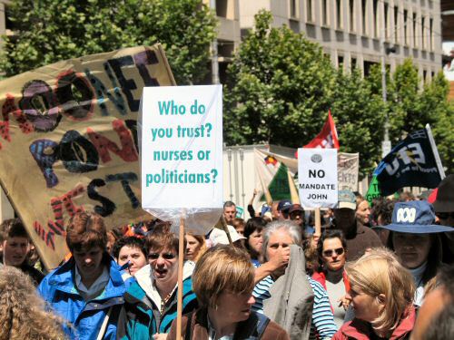 Placard- Who do you trust? Nurses or politicians?