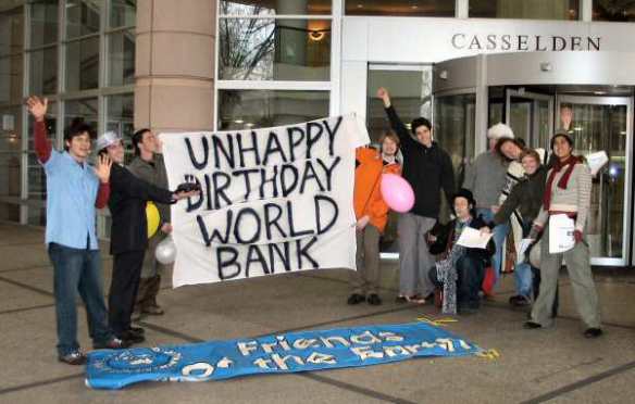 Protesters with banner - Unhappy Birthday World Bank