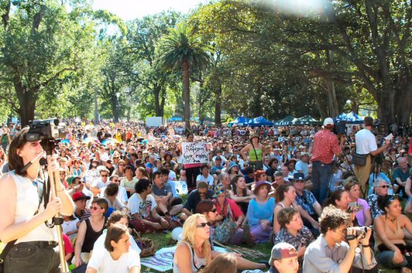 Crowd filling part of Treasury Gardens