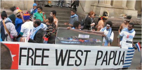 Banner - Free West Papua and photos of boat recently arrived in Australia