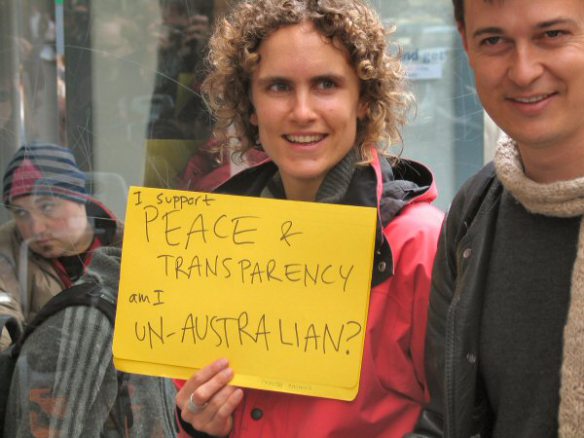 Protester with placard - I support Peace and Transparency Am I Un-Australian?