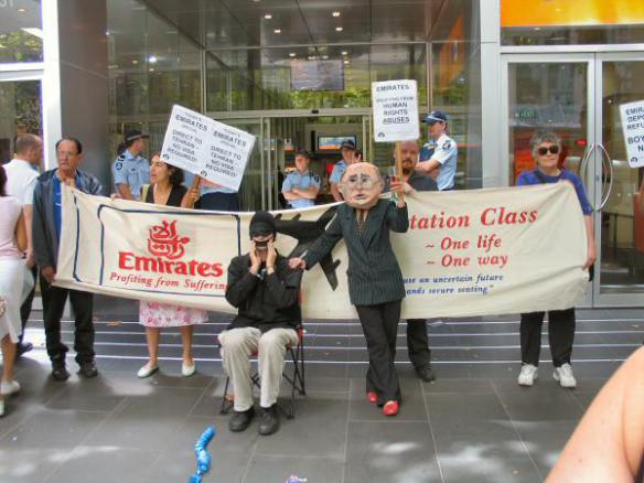 Protester with John Howard mask