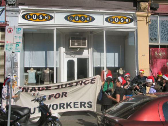 Banner outside Lush - Wage Justice for Outworkers