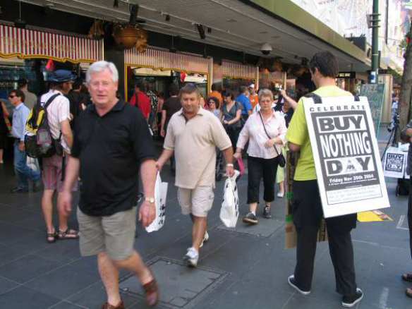 Shoppers loaded with bags of purchases