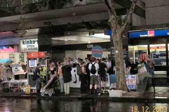 Protesters gathering in the rain