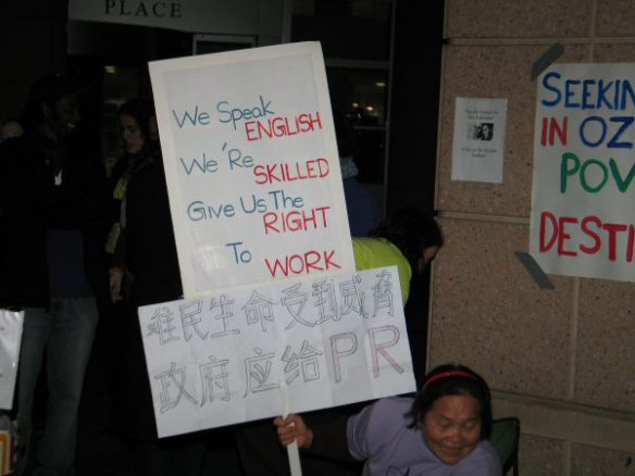 Placard in English and Chinese calling for right to work