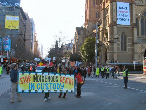 Banner on St Paul's as march reaches Flinders Street - Make Indigenous Poverty History