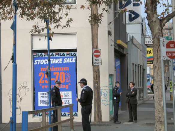 Uniformed police around store