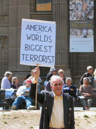 Elderly protester with placard