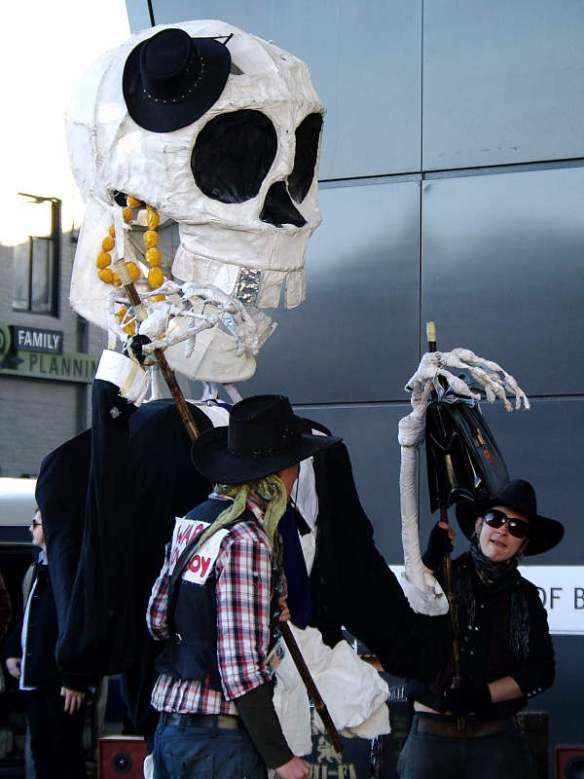 Large skeleton puppet with briefcase of money etc