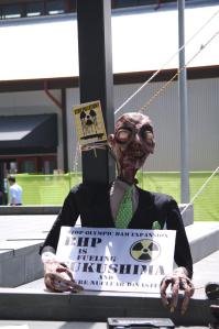 Mr Death puppet with JFP placard