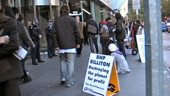 Outside BHP - Placard reads BHP Billiton, Destroying the planet for profit