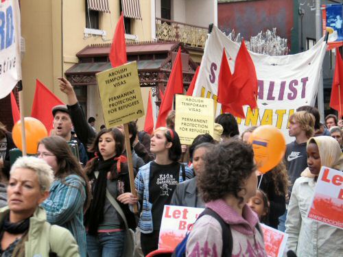 Young marchers and red flags