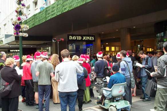 The choir and audience viewed from the street