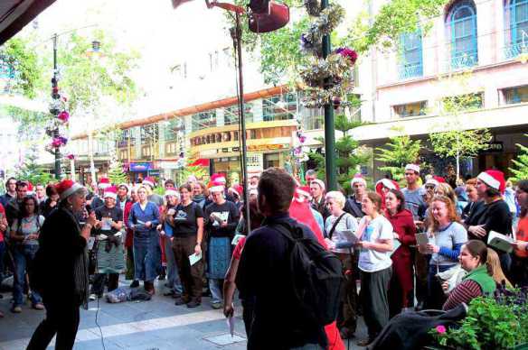 Pamela Curr as Santa at the microphone