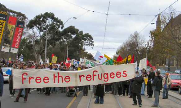 Banner leading march - Free the Refugees