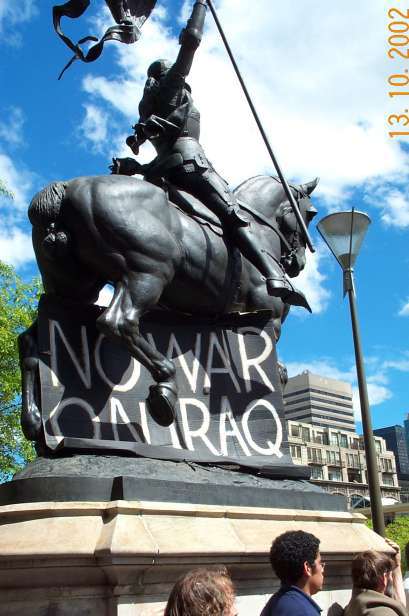 No war on Iraq banner of statue of Joan of Arc