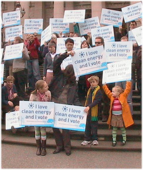 Children with placards at front of protest