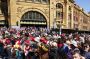 Crowds gather for the grand final day parade in 2014.