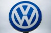 The VW logo stands outside the Volkswagen AG headquarters in Wolfsburg, Germany, on Wednesday, Sept. 23, 2015. Volkswagen's escalating scandal over emissions-test cheating is beginning to ripple across the $10 trillion global corporate bond market. Photographer: Krisztian Bocsi/Bloomberg