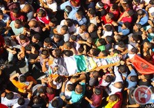 West Bank:  Clashes as thousands march in slain Palestinian’s funeral