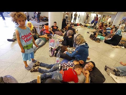 Thousands stuck in Budapest as Hungary refuses to allow migrants to travel