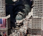 File - Ground Zero, New York City, N.Y. (Sept. 17, 2001) -- An aerial view shows only a small portion of the crime scene where the World Trade Center collapsed following the Sept. 11 terrorist attacks.