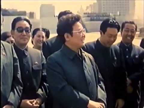 Comrades Kim Il Sung and Kim Jong Il working together